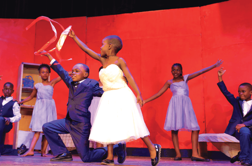 Kids perform a Dance Choreographed by Mbabazi Joana for the Dynamo theatre kids performance of a Christmas Carol at the national Theatre in 2019