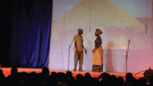Actors Baguma Mathew and Namboze Gloria in the Dynamo theatre stage adaptation of Laury Lawrence Ocen's novel The Alien Woman